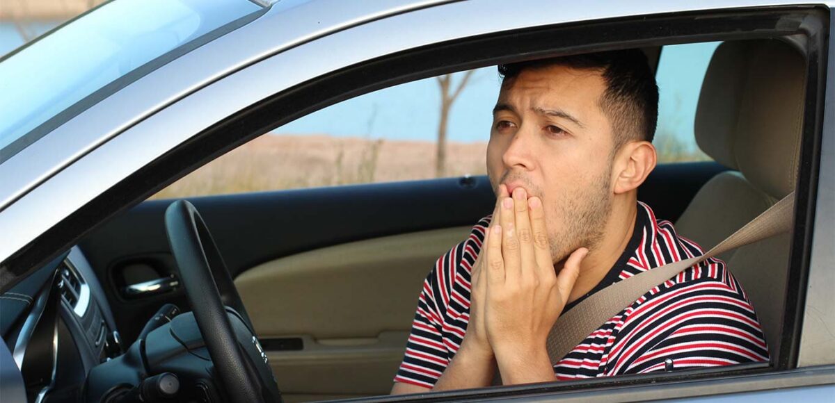 concerned man driving