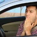 concerned man driving