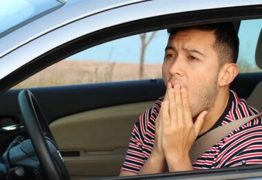 concerned man driving