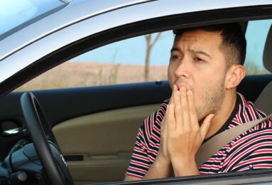 concerned man driving