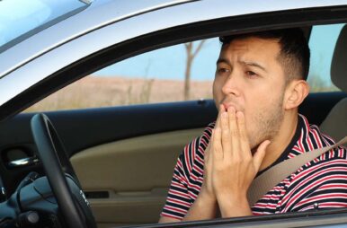 concerned man driving